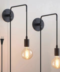 Set Of 2 Plug In Wall Sconces In Metal Black With Swing Arm And On Off Switch Cozy Vintage Industrial Wall Lighting displayed on wall