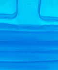 Close-up of the clear inflatable material of the Kick Back On This Hella Comfy Clear Inflatable Sofa Chair For Two.