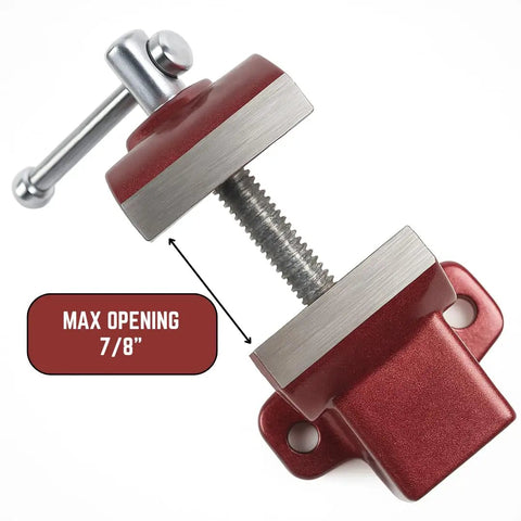 Compact One Inch Fixed Bench Vise For Jewelry Making And Crafting One And A Quarter Inch Jaw Width Tiny Yet Mighty Grip For Precision Work In Small Workspaces. red fixed bench vise, 7/8-inch max opening, metal jaws, for jewelry making
