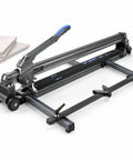 Heavy Duty Manual Tile Cutter With Bright Green Laser Guide And Beefed Up Steel Rails For Straight Cuts Up To 1800 Mm on a work surface.
