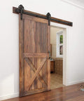 Premium 6.6 Feet Sliding Barn Door Hardware Kit In Matte Black Steel With Thick Spoke Wheels Runs Slick On Interior Walls Or Closets For Quick DIY Setup And A Rad Room Refresh Track Only installed with a rustic wood door.