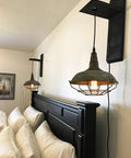 Farmhouse Plug In Pendant Light With 16 Feet Hanging Cord And Wire Cage Shade in bedroom, dark charcoal gray finish, industrial style.