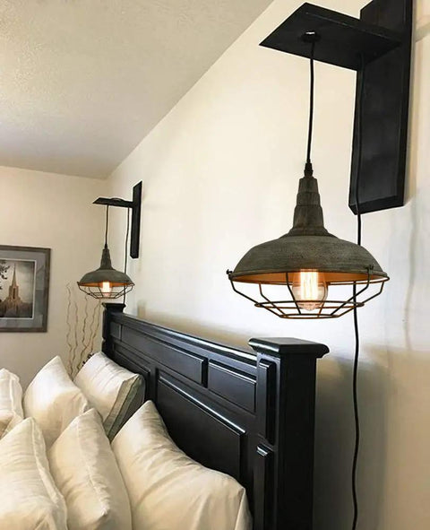 Farmhouse Plug In Pendant Light With 16 Feet Hanging Cord And Wire Cage Shade in bedroom, dark charcoal gray finish, industrial style.