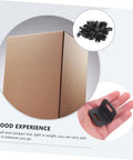 One Hundred Piece Heavy Duty Plastic Corner Protectors L Shaped Edge Guards displayed with a hand, showcasing compact black design.