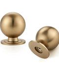Sleek Champagne Bronze Round Dresser Knobs 12 Pack 0.95 Inch Diameter Dope Zinc Alloy Hardware For Cabinets And Drawers Modern Minimalist Look That Upgrades Any Furniture Quickly And Easily. Two champagne bronze round zinc alloy dresser knobs, one front view and one angled