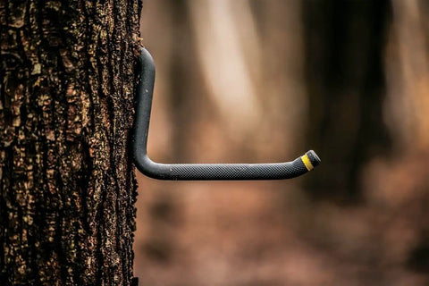 Grippy Heavy Duty Self Tapping Slip Resistant Tree Step with knurling pattern attached to a tree, side view