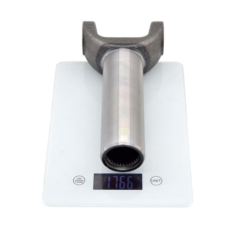 Slip Yoke Replacement 3-3-5551X for GM Turbo 400 TH 400 Transmissions on a digital scale weighing 1766 grams.