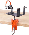 Adjustable Angle Grinder Holder with a Savage Grip Vise Base for hands-free grinding tasks, featuring a sturdy orange clamp.