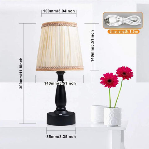 Lit Two Pack Battery Powered LED Night Lights Portable Dimmable Warm White Eye Protection Lamps With Remote set on a table