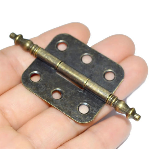 Top Shelf Vintage Folding Hinges With Screws Rock Solid Antique Bronze Zinc Alloy Hardware For Diy Projects Wooden Crates Cabinets And Keepsake Cases Easy Peasy Install And Dang Fine Finish shown in hand.