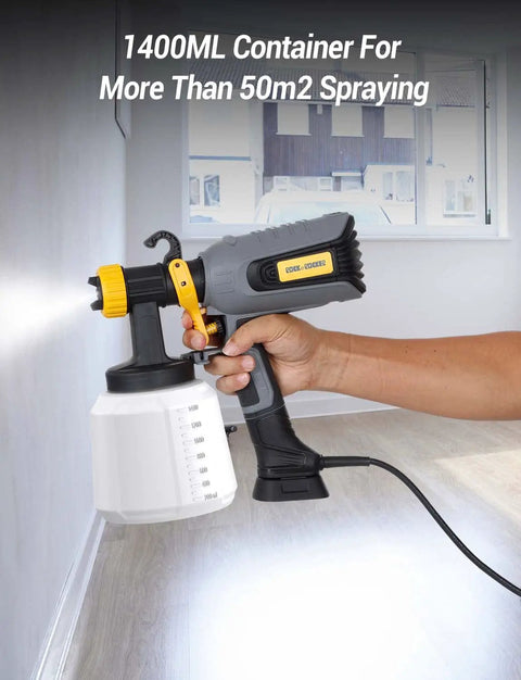 All Around Paint Sprayer For Home Interior And Exterior With 1400ml Tank, 550W, spraying white paint on wall indoors
