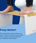 Person using Stockholm Folding Bamboo Toilet Stool 7 Inch Collapsible For Easier Pooping Brown And White Bathroom Accessory
