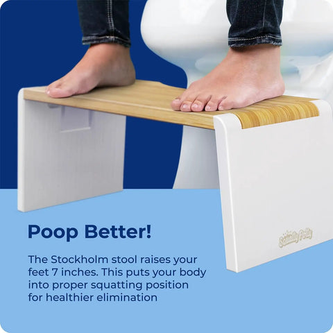Person using Stockholm Folding Bamboo Toilet Stool 7 Inch Collapsible For Easier Pooping Brown And White Bathroom Accessory
