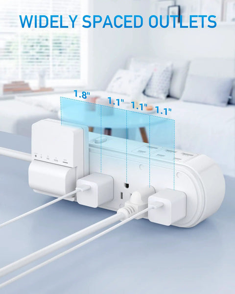 All In One Power Strip Surge Protector With USB C PD, 10 Wide Spacing Outlets, flat plug, shown on desk next to bed.
