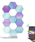 11Pack WiFi Smart LED Light Kit For DIY Night Lamp With Voice Control, app-adjusted hexagonal light panels displayed on a stand