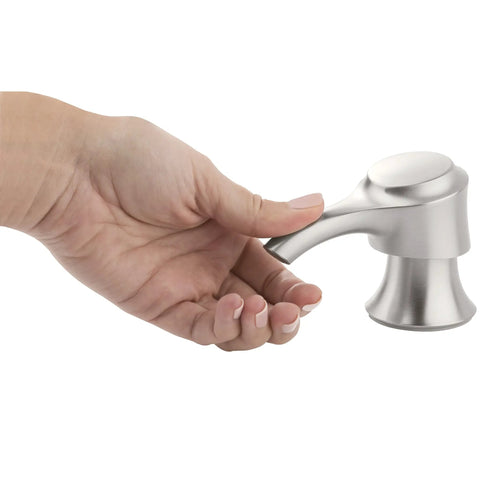 Hand reaching for soap dispenser of Antrom Kitchen Faucet With Pull Down Sprayer And Built In Soap Dispenser, Stainless Steel Finish.