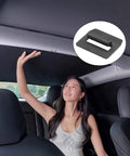 Woman installing Tesla Sunshade Clips Kit For Model 3, Model Y, Model S, Model X And Cybertruck 2025, showing easy installation.