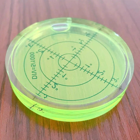 66mm Circular Bubble Spirit Level With Degree Marked Surface, Round Acrylic Level Tool For Precise Layouts And Measuring, Non Sticky 10mm Thick, 2.59 Inch Diameter on wood