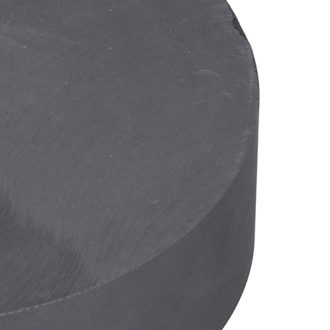 Close-up of Premium Pro Grade High Purity Graphite Ingot Block 95 To 98 Percent, round 120mm diameter, 30mm thick for industrial use.