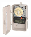 Open beige NEMA 3R enclosure showing Double Pole Mechanical Time Switch with dial and trippers for 208-277 VAC control, industrial timer.