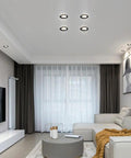Image of 12 Pack Swanky LED Recessed Downlights Brushed Brass And Black Gold Finish 5W 7W in modern living room setting.