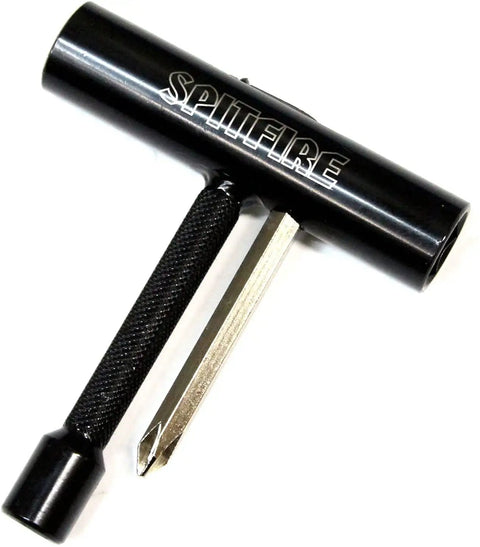 All In One Skateboard And Longboard T3 Tool With Pocket Size Design Includes Three Eighths Inch One Half Inch And Nine Sixteenths Inch Sockets Plus Allen And Phillips Drivers For Quick On The Go Repairs, black tool with metal drivers visible.