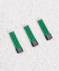 Three 4601H Bipolar Latch Hall Effect Sensors for E-Bike Motors with analog voltage output, green components on white surface.