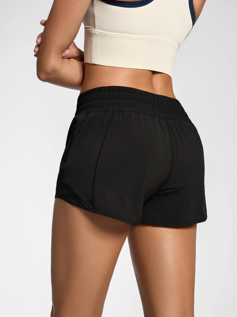 Back view of Womens 2.5 Inch Quick Dry Gym Shorts With High Waist And Zip Pockets Built In Liner Breathable Mesh Panels For Cool Air