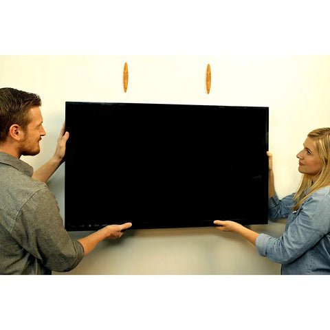 Two people mounting TV using Magnetic Stud Finder Thats Easy To Use No Batteries Made In The USA Powerful Magnet Locates Drywall Studs Fast.