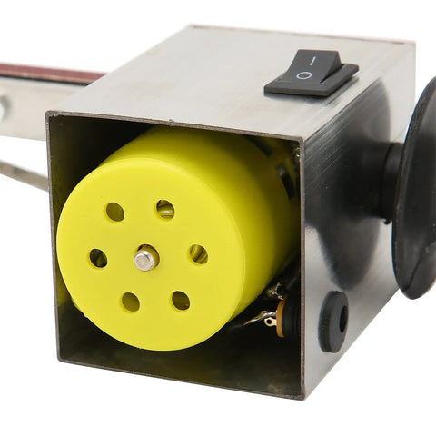 Heavy Duty Mini Belt Sander Workhorse Packing 150 Watt Brass Core Motor showing yellow motor with switch and housing.