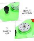 Close-up of Mini Solar Powered Generator Motor for DIY Science Projects and STEM Kits on green base, sturdy material, easy to use.