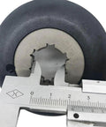 Clutch for Cam Helix, black rubber outer with silver metal hub, approx 40 mm diameter.