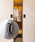 Recessed Flush Pull Handle With Mounting Screws Black Zinc Alloy installed on a closet door, highlighting compact space-saving design.
