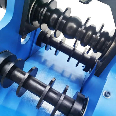 Close-up of WYDDDARY Manual Pipe Bender Machine With Round And Square Dies showcasing rollers for bending tubes.