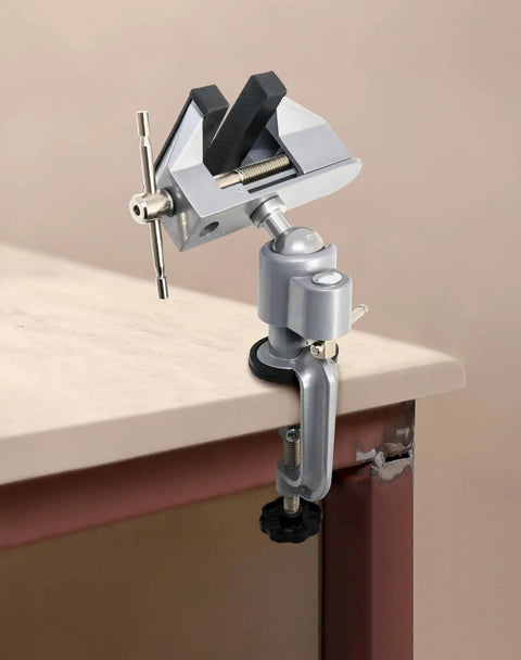 Two Pack 3 Inch Universal Tabletop Clamp Vise With 360 Degree Rotation and 45 Degree Tilt on workbench edge.