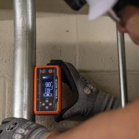 Digital Level And Angle Gauge Kit With Plumbers Straps Magnetic Base And Alarm For Pros, tool displaying 90-degree angle on pipe.