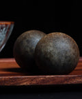 Dope Vietnam Nha Trang Agarwood White Aquilaria Old Growth Raw Material spheres on wood surface