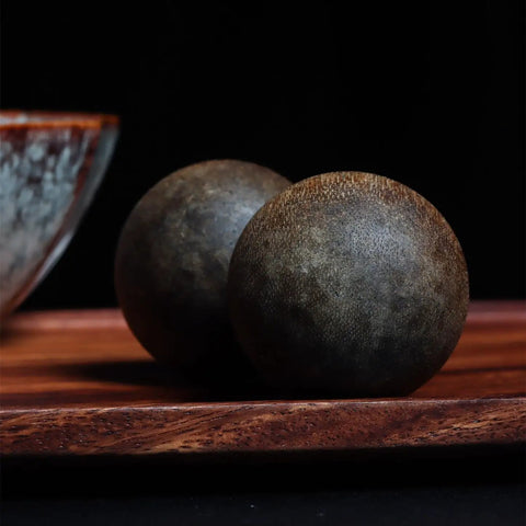 Dope Vietnam Nha Trang Agarwood White Aquilaria Old Growth Raw Material spheres on wood surface