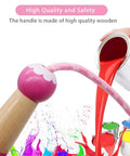 Close-up of pink Kids Jump Rope 7ft Adjustable Cotton Skipping Rope With Wooden Handles, paint elements visible in background.