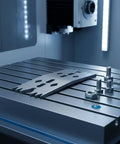 Heavy Duty Stainless Steel Clamping Plate For Woodwork And Metal Fabrication With Serrated Slots and Flexible Positioning For CNC Routers and Carpentry Projects That Get Stuff Done Right The First Time Every Damn Day on a machine table with hardware.