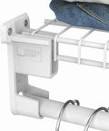 Slick SuperSlide Wire Shelving Support Bracket With Preloaded Wall Anchors For Straight Up Easy Mount On Three Quarter Inch Closet Rods White Finish installed on a rod with jeans.