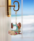 Six Piece DIY 5D Sewing Machine Diamond Painting Keychain Kit Set hanging on a key hook
