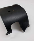 Angled front view of black plastic steering column shroud cover for Silverado tilt steering, 1999–2002.