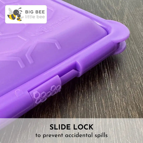 SoftShell Reusable Silicone Food Storage Container With Connected Clamshell Lid Snap Closure Keeps Lids Attached No Lid Drama Leak Resistant Not Leak Proof Easy Clean Travel Ready Meal Prep Microwave Freezer And Dishwasher Safe purple container with slide lock detail