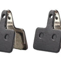 Fifteen Pair Top Shelf Bicycle Brake Pads Resin Compound Rotor Replacement For Hydraulic Disc Systems With Killer Grip Stopping Power And Ride Easy Durability, close-up view of black resin pads.