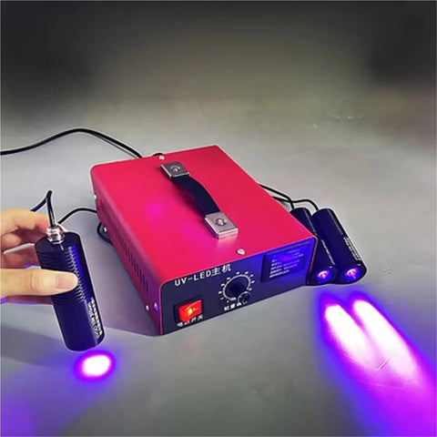 Built Tough Multi Lamp UV Curing Light At Two Thousand Watts with handheld unit, designed for PCB screen fixes and resin bonding.
