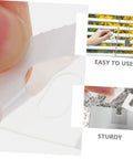 Vertical Blind Repair Tabs Pack Of 50 For Easy Replacement Fixers with close-up of white tab being applied on blinds