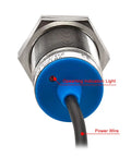 Close-up of Inductive Proximity Sensor Shield Type M30 10mm Sensing Range, showing operating light and power wire