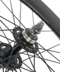 Close-up of axle and spokes on Ride Ready 88mm Fixed Gear Wheel 700c Carbon Clincher Rear Wheel for Single Speed Builds.
