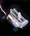 High Octane 1.5G Micro Digital Servo Packing Serious Torque For Smooth 3D RC Helicopter Flight Ultra Feathery Weight Build, close-up on motor and gears.